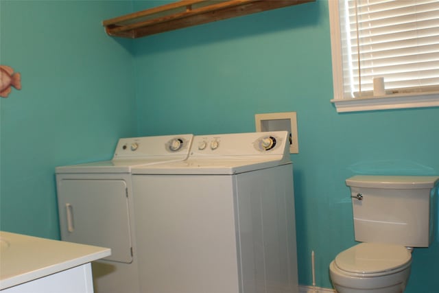 washroom with washer and clothes dryer