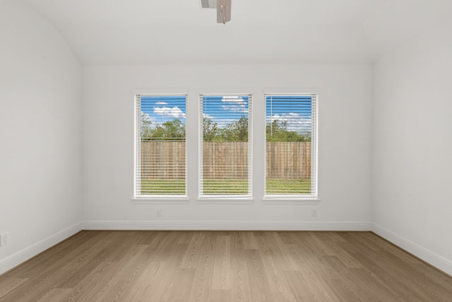 spare room with light wood-type flooring