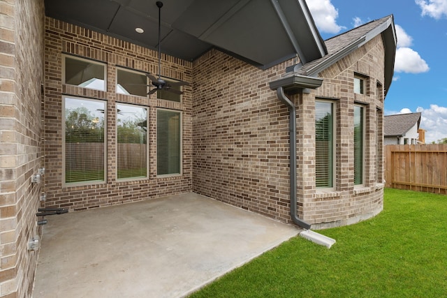 view of patio featuring ceiling fan