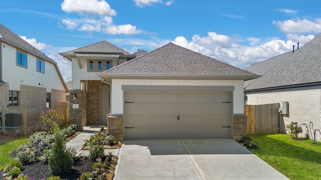 view of front of home featuring central air condition unit