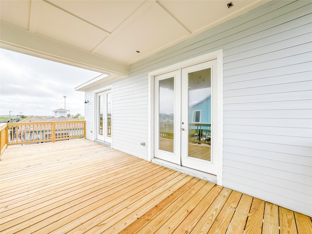 wooden terrace with french doors