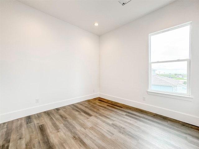 empty room featuring light hardwood / wood-style floors