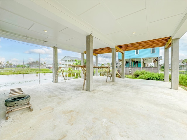 view of patio / terrace with a water view