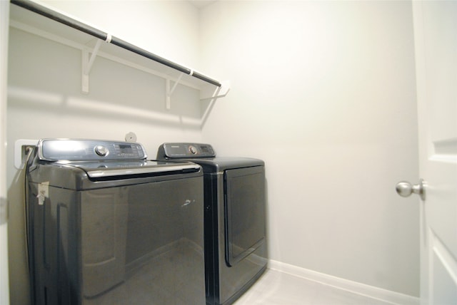 washroom featuring separate washer and dryer