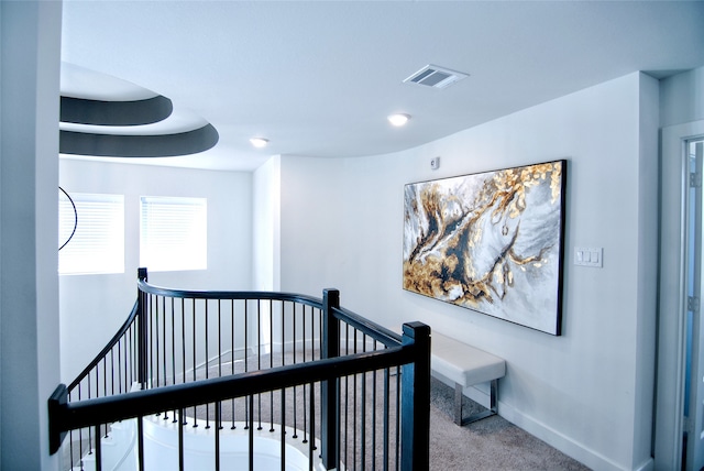 hallway featuring carpet floors