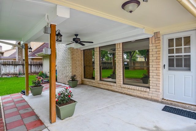 view of patio featuring ceiling fan