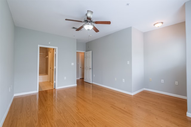 unfurnished room with light hardwood / wood-style floors and ceiling fan