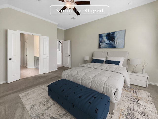 carpeted bedroom featuring ceiling fan and crown molding