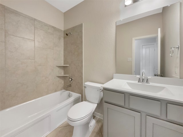 full bathroom with tile flooring, tiled shower / bath combo, toilet, and large vanity