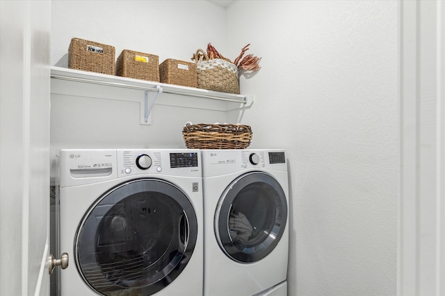 laundry room with washer and dryer