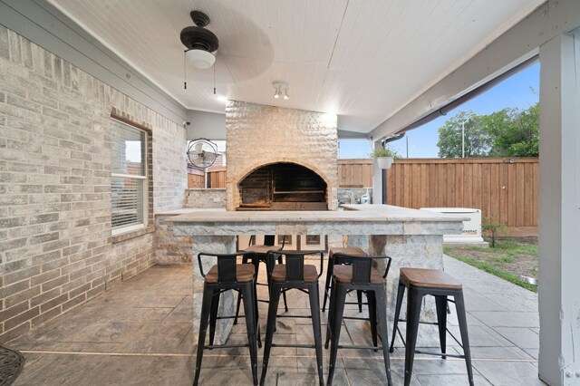 view of patio / terrace with exterior bar