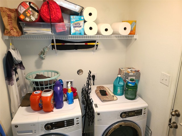 laundry area with washing machine and dryer