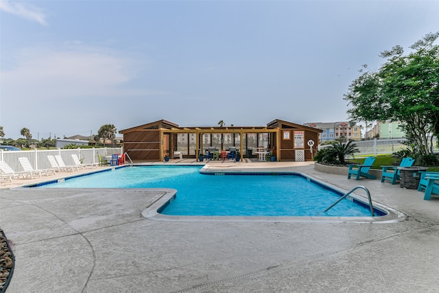 view of pool featuring a patio