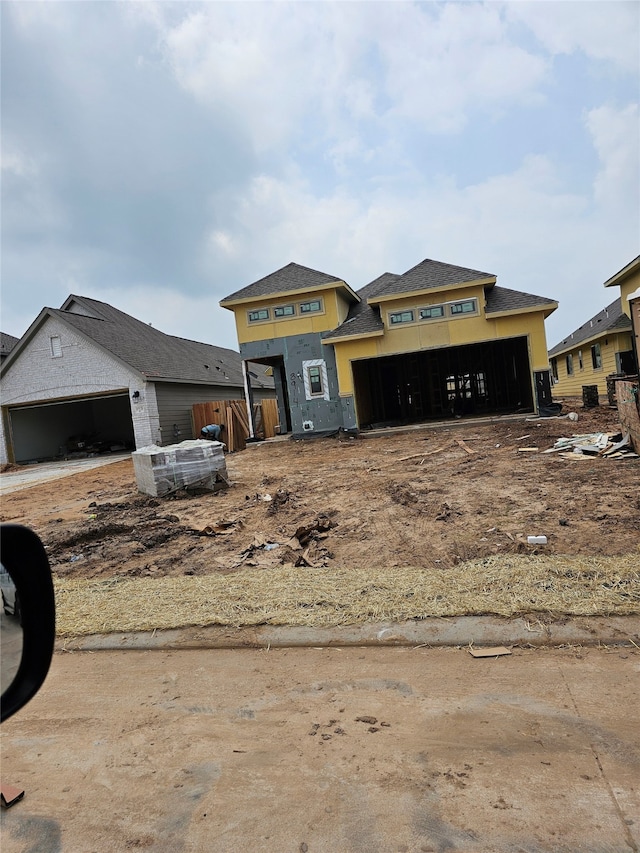 view of front of property featuring a garage