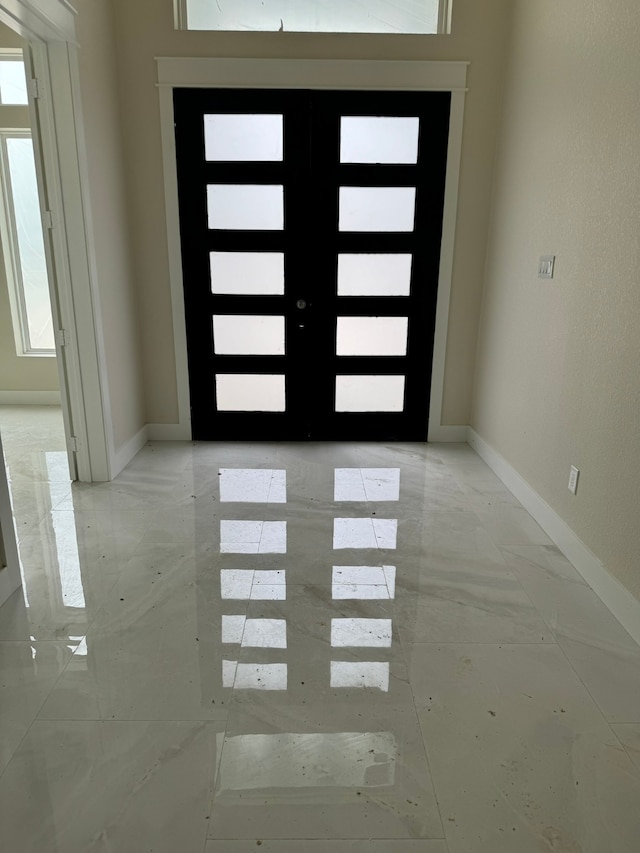 entryway featuring french doors