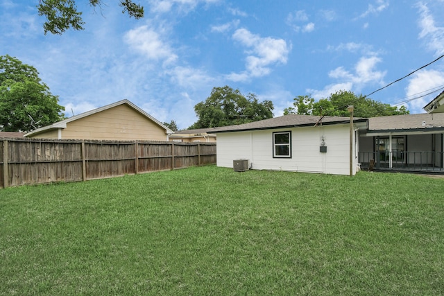 view of yard featuring a sunroom