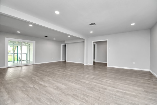 empty room with light wood-type flooring