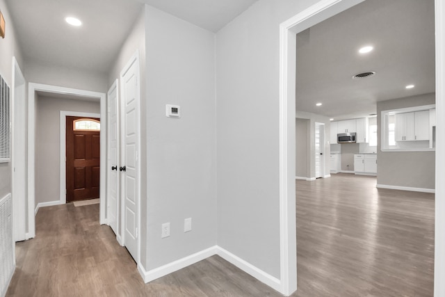 hall featuring hardwood / wood-style floors