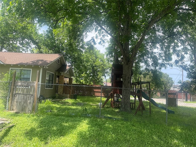 view of yard with a playground