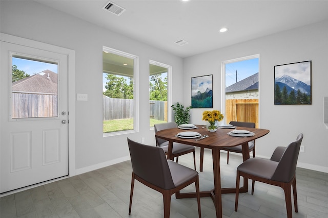 dining room featuring light hardwood / wood-style flooring