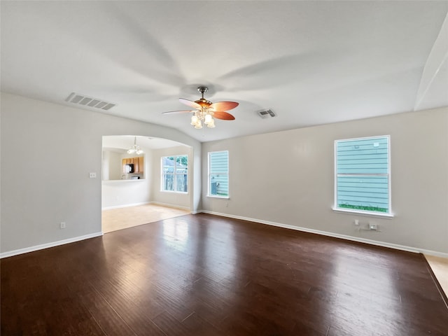 empty room with hardwood / wood-style floors and ceiling fan