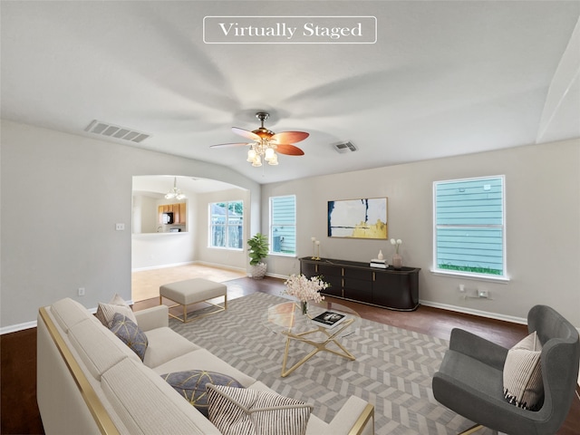 carpeted living room featuring ceiling fan