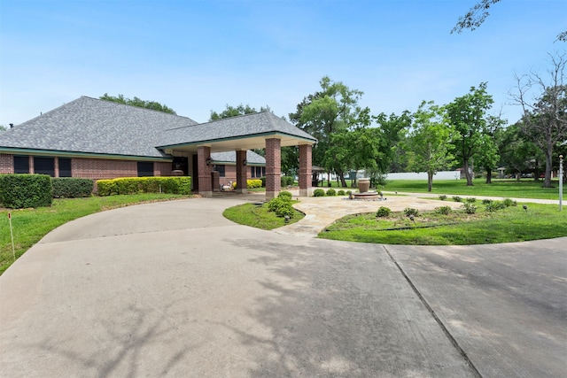 exterior space with a front yard