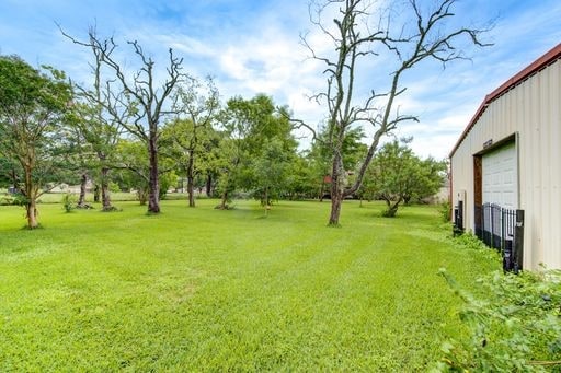 view of yard featuring a garage