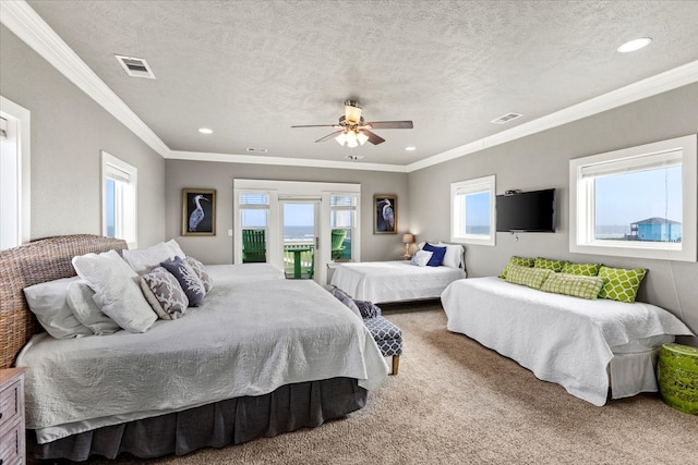 carpeted bedroom featuring ornamental molding, ceiling fan, access to exterior, and a textured ceiling