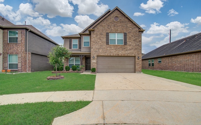 view of front of house with a front yard and a garage