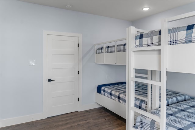 bedroom featuring dark hardwood / wood-style floors