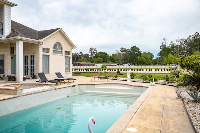 view of pool with a patio