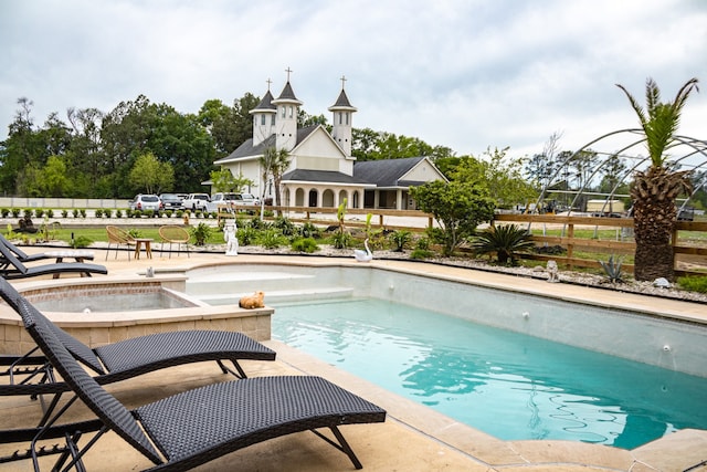 view of pool featuring a patio area