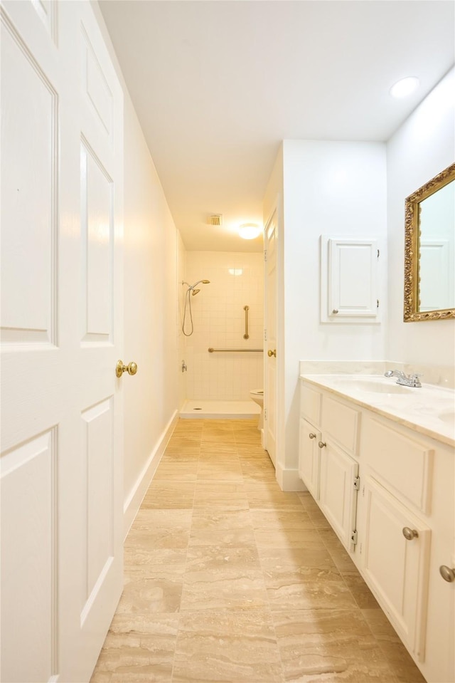 15830 Whipple Tree Dr, Houston, TX 77070 - full bathroom with a shower, vanity, baseboards, and toilet
