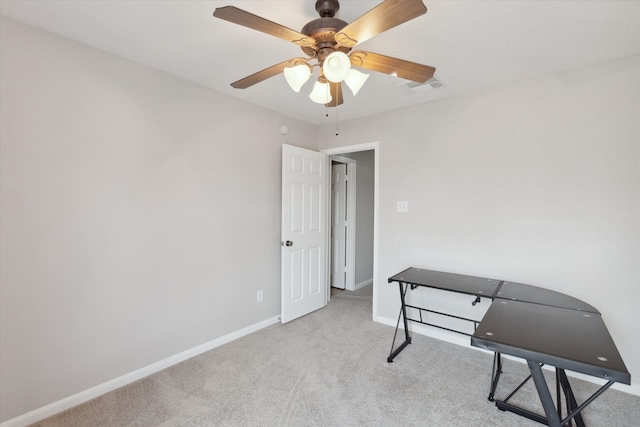 interior space featuring carpet floors and ceiling fan