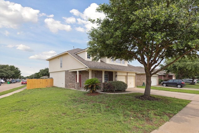 view of front facade with a garage and a front yard