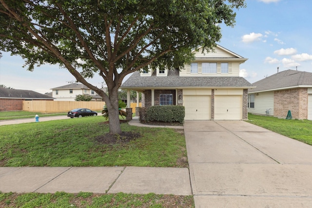 view of front of house with a garage and a front yard