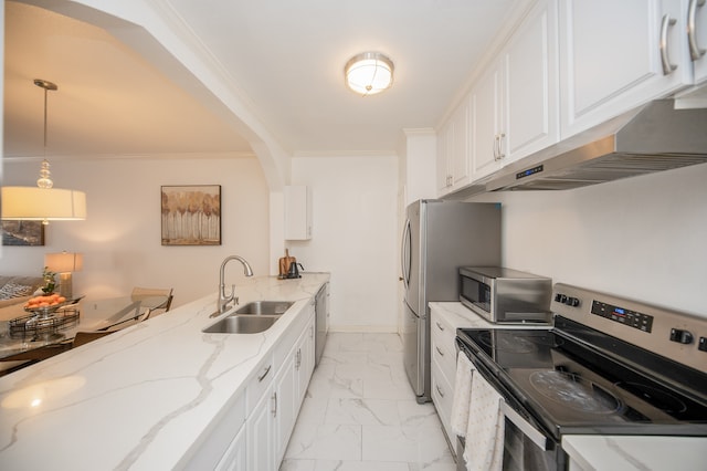 kitchen with appliances with stainless steel finishes, crown molding, sink, pendant lighting, and white cabinets