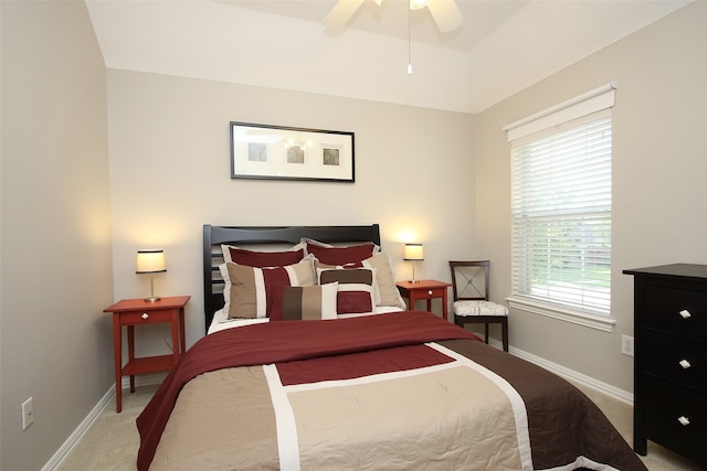 carpeted bedroom featuring ceiling fan