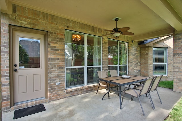 view of terrace featuring ceiling fan