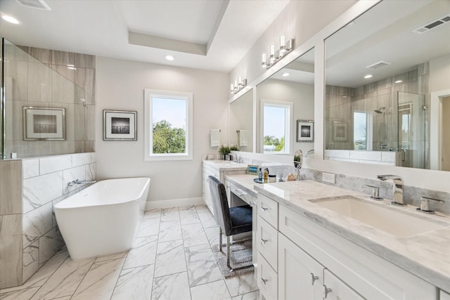 bathroom featuring visible vents, baseboards, a soaking tub, marble finish floor, and a shower stall