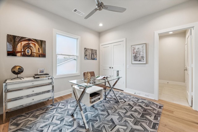 office area with baseboards, wood finished floors, visible vents, and recessed lighting