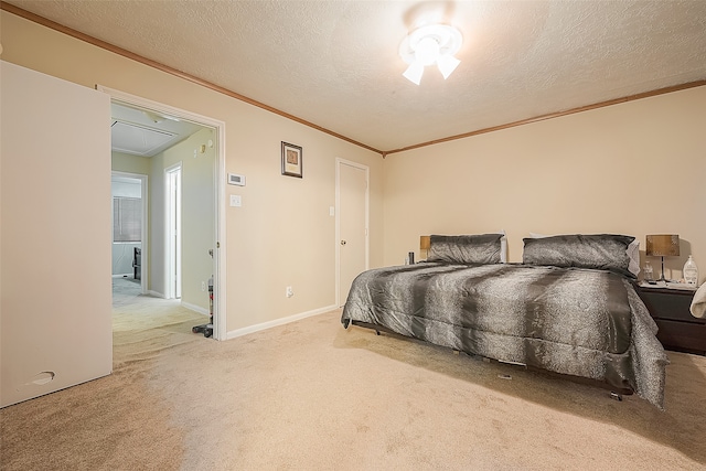 bedroom featuring ornamental molding, carpet, ceiling fan, and a textured ceiling