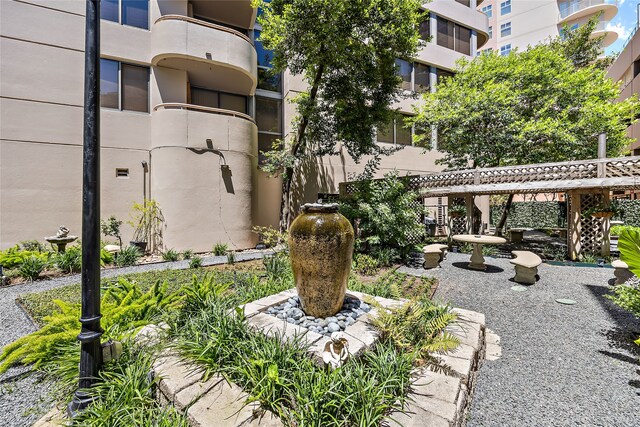 view of property's community with a pergola