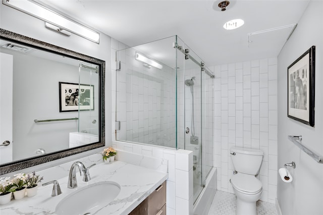 bathroom with tile walls, toilet, tile flooring, tasteful backsplash, and vanity