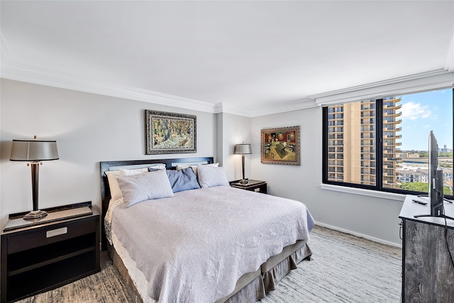 bedroom with crown molding