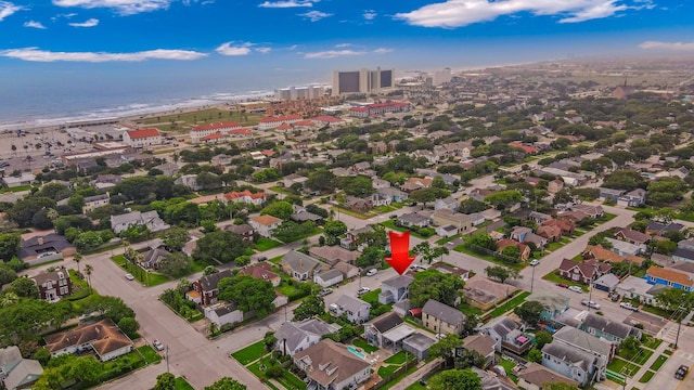 aerial view with a view of the beach and a water view