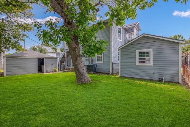 view of yard featuring central AC