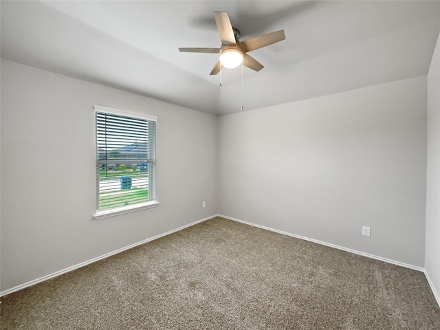 unfurnished room featuring carpet and ceiling fan