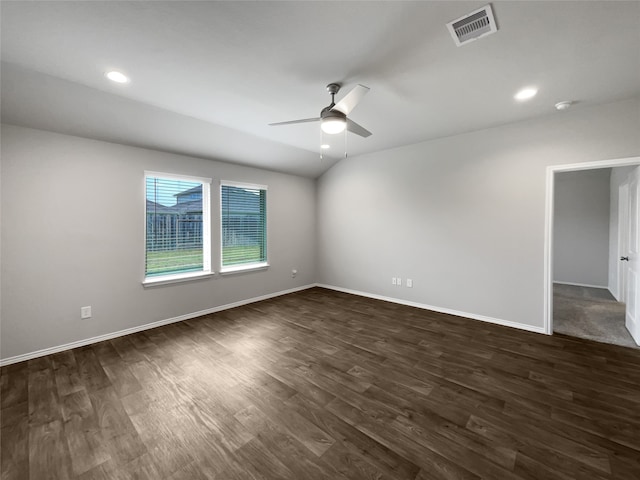 unfurnished room with ceiling fan and dark hardwood / wood-style floors